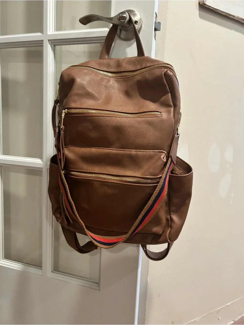 Classic Brown Leather Women's Backpack with Striped Shoulder Strap